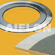 Serrated gasket with outer ring